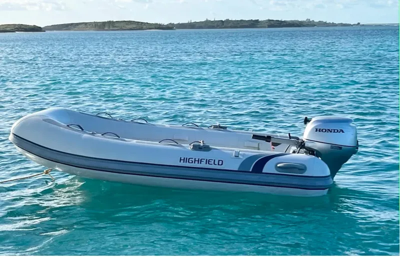 Slide: The Image of Inflatable boat with Honda motor on turquoise water, Leopard 40, year 2018. - 22