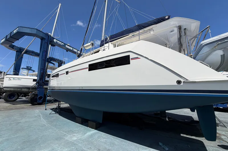 Slide: The Image of 2018 Leopard 40 catamaran on dry dock, showcasing sleek design and modern features. - 25