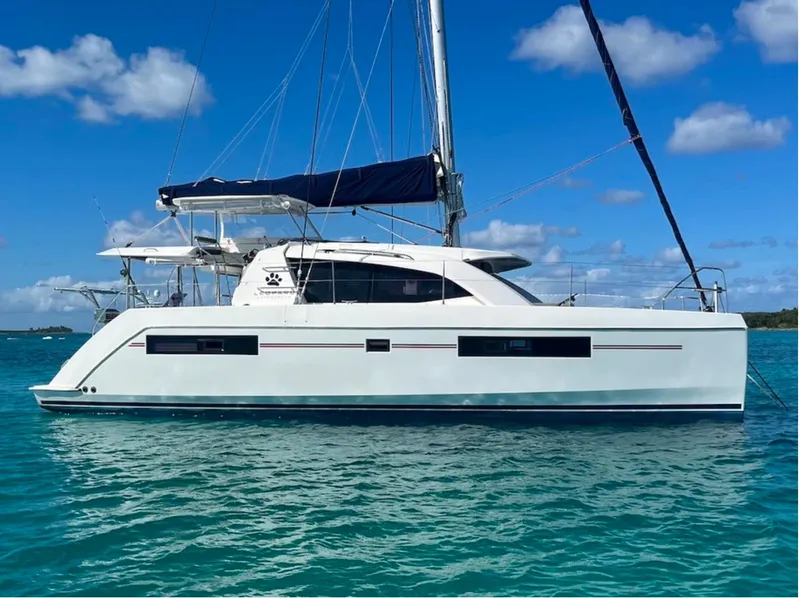 Slide: The Image of Leopard 40 catamaran 2018 on calm waters under blue sky. - 3