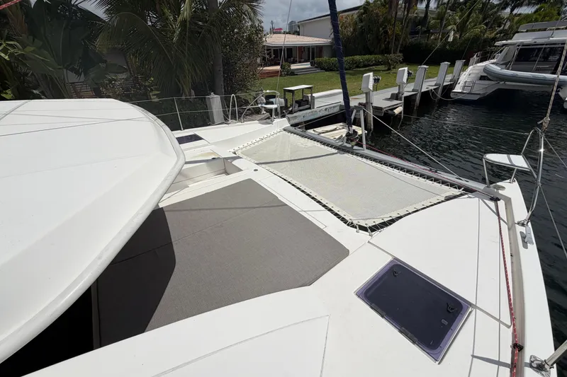 Slide: The Image of 2018 Leopard 40 catamaran deck with netting and dock view. - 42