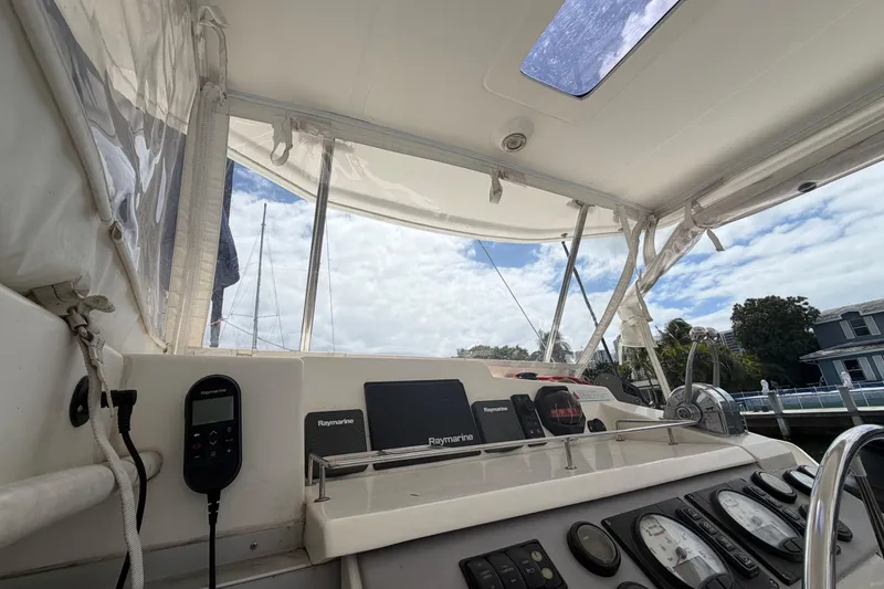 Slide: The Image of Interior view of a 2018 Leopard 40 catamaran cockpit with navigation equipment. - 51