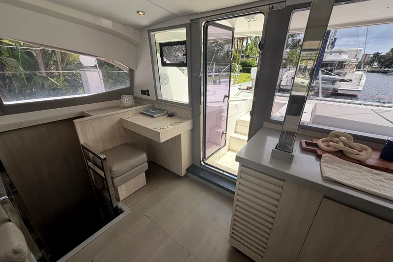 Slide: The Image of Interior of a 2018 Leopard 40 catamaran with modern design and outdoor view. - 58