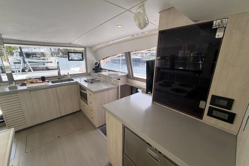 Slide: The Image of Modern kitchen interior of 2018 Leopard 40 catamaran with sleek design and waterfront view. - 61