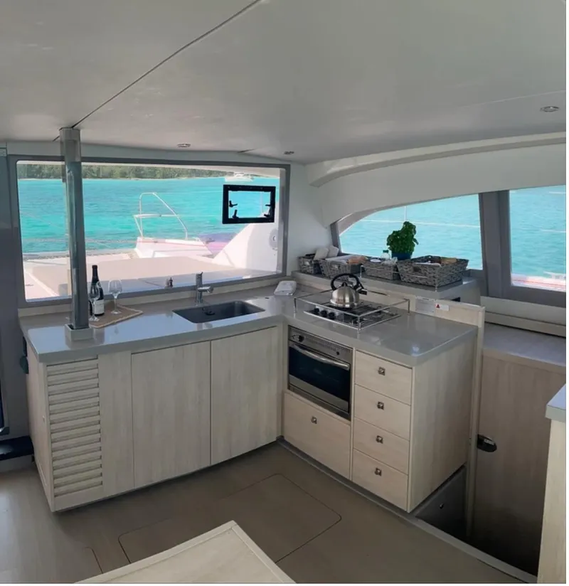 Slide: The Image of Interior of a 2018 Leopard 40 yacht featuring a modern kitchen. - 9