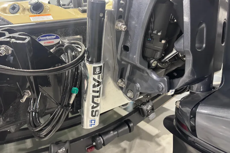 Slide: The Image of Close-up of 2026 Skeeter ZXE21 boat engine components and wiring. - 11