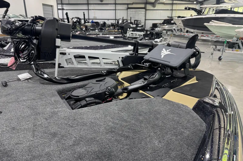 Slide: The Image of 2026 Skeeter ZXE21 boat interior with advanced navigation system and trolling motor. - 3