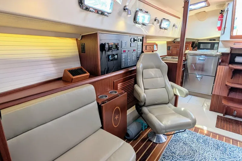 Slide: The Image of Interior of 1999 Island Packet 349 yacht with leather seating and modern amenities. - 13