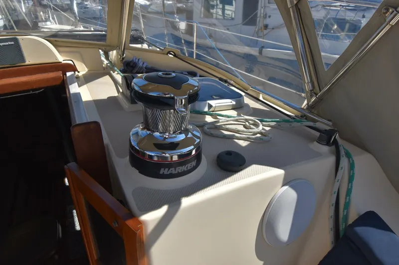 Slide: The Image of Island Packet 349 sailboat cockpit with Harken winch and ropes, 1999 model. - 5