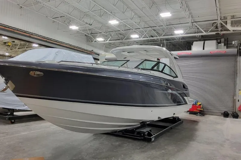 The Image of 2026 Formula 360 Crossover Bowrider I/O in a showroom, showcasing sleek design and modern features. - 0