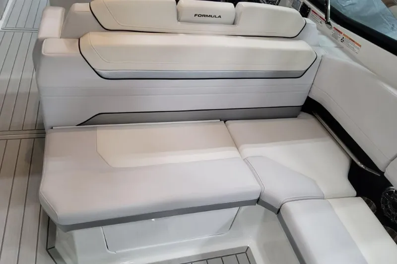 Slide: The Image of 2026 Formula 360 Crossover Bowrider I/O interior seating with sleek white upholstery. - 10