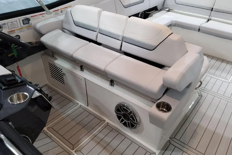 Slide: The Image of Luxurious seating in 2026 Formula 360 Crossover Bowrider I/O with modern design and cup holders. - 11