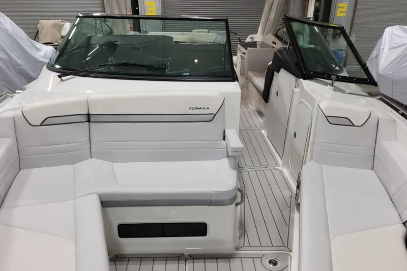 Slide: The Image of 2026 Formula 360 Crossover Bowrider I/O interior with sleek seating and modern design. - 12