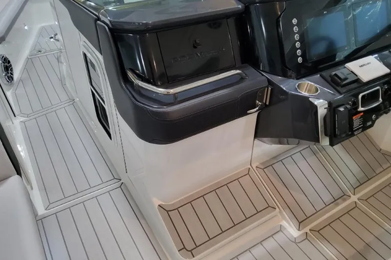 Slide: The Image of Interior of 2026 Formula 360 Crossover Bowrider I/O, featuring sleek dashboard and modern controls. - 13