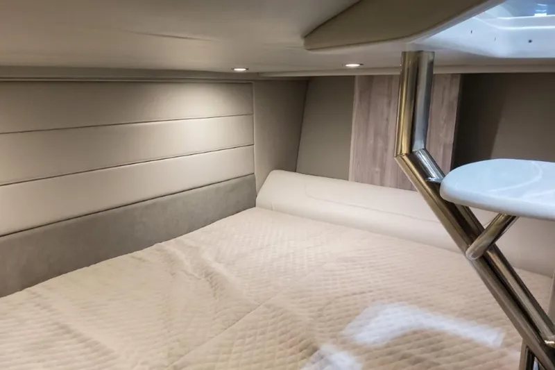 Slide: The Image of Interior cabin of 2026 Formula 360 Crossover Bowrider I/O, featuring modern design and cozy bedding. - 15