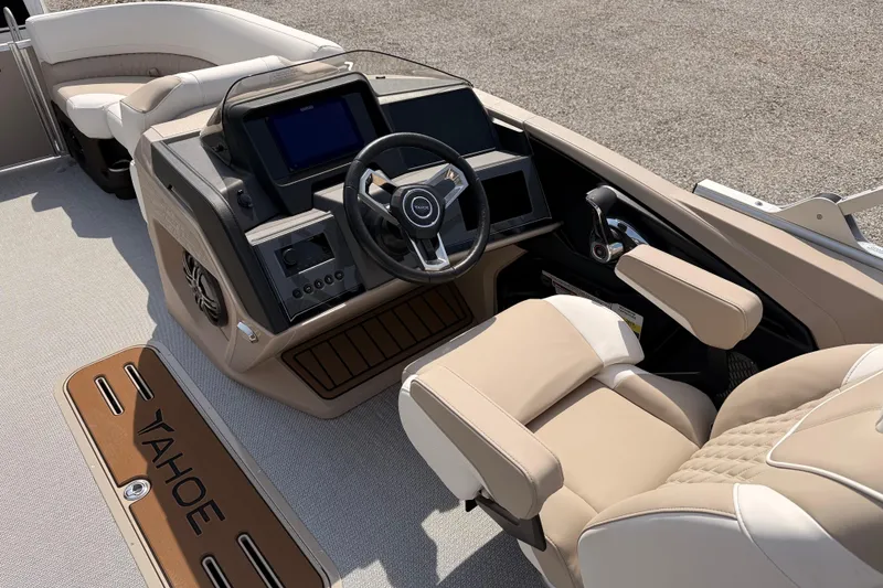 Slide: The Image of 2026 Tahoe Pontoon Cascade Quad Lounger interior with modern dashboard and comfortable seating. - 16