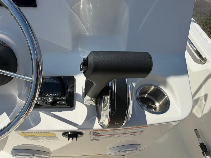 Slide: The Image of 2024 Boston Whaler 150 Montauk helm with JL Audio system. - 11