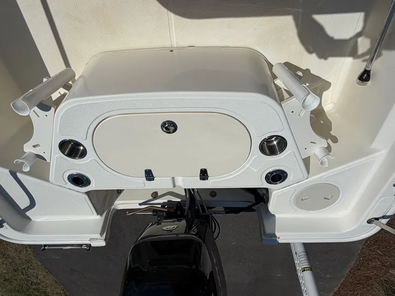 Slide: The Image of Rear view of a 2024 Boston Whaler 150 Montauk boat. - 4