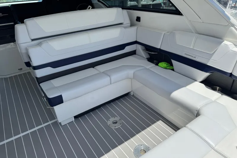 Slide: The Image of 2024 Formula 380 Super Sport Crossover OB interior with sleek white seating and modern design. - 15