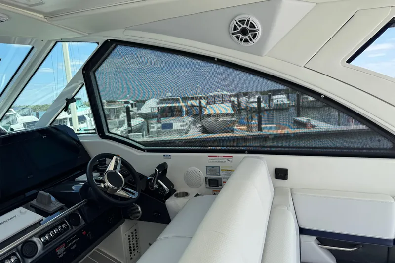 Slide: The Image of Interior view of 2024 Formula 380 Super Sport Crossover OB boat cockpit. - 20