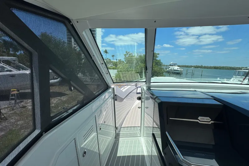 Slide: The Image of 2024 Formula 380 Super Sport Crossover OB interior with waterfront view. - 22