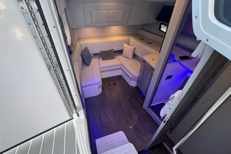 Slide: The Image of Luxurious interior of 2024 Formula 380 Super Sport Crossover OB with modern seating and ambient lighting. - 28