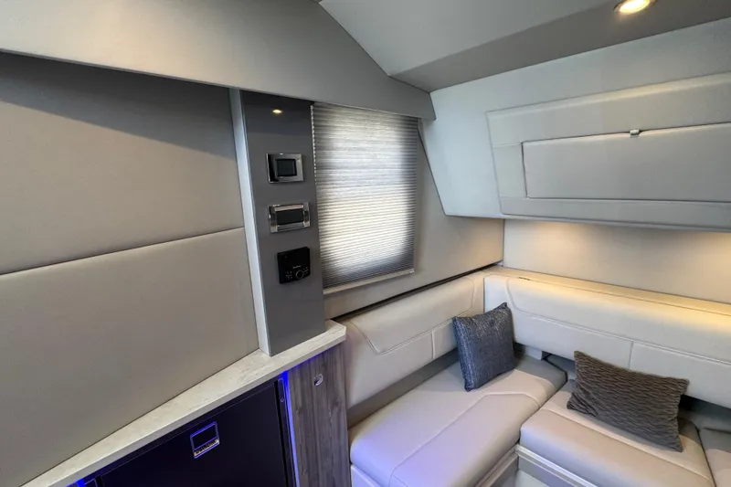 Slide: The Image of 2024 Formula 380 Super Sport Crossover OB interior with modern seating and control panel. - 30