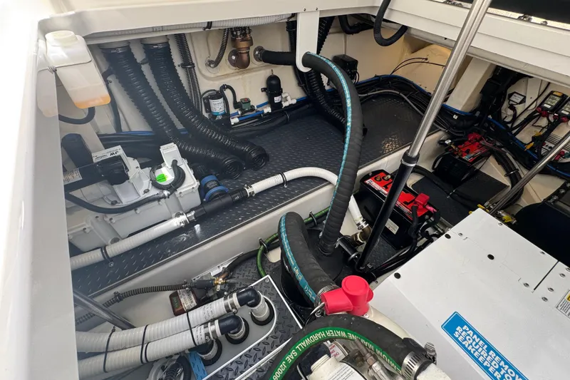 Slide: The Image of Engine compartment of 2024 Formula 380 Super Sport Crossover OB, showcasing wiring and components. - 39