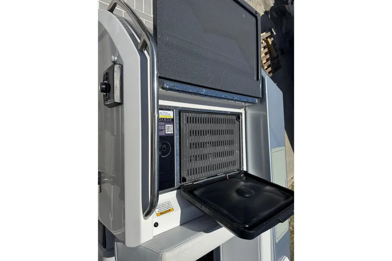 Slide: The Image of 2024 Formula 380 Super Sport Crossover OB onboard grill and cooking station. - 40