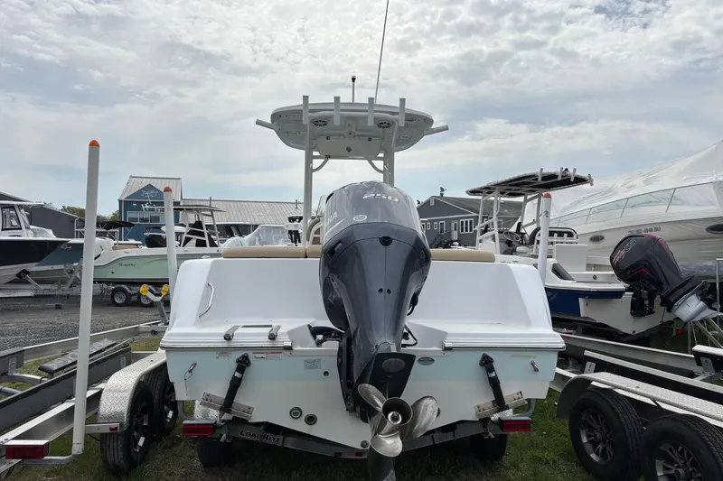 Slide: The Image of 2018 Sportsman Heritage 231 Center Console boat with Yamaha engine on trailer. - 2