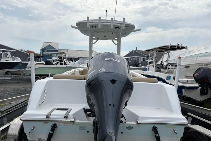 Slide: The Image of 2018 Sportsman Heritage 231 Center Console boat with Yamaha 250 engine at marina. - 3
