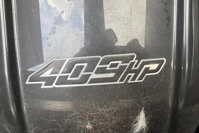Slide: The Image of Supreme ZS232 2019 engine cover displaying 409 horsepower badge. - 14