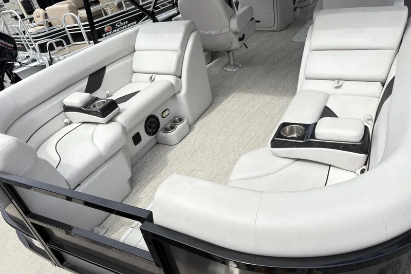 Slide: The Image of Luxurious interior of 2023 SunCatcher X322 RC pontoon boat with plush seating and cup holders. - 8