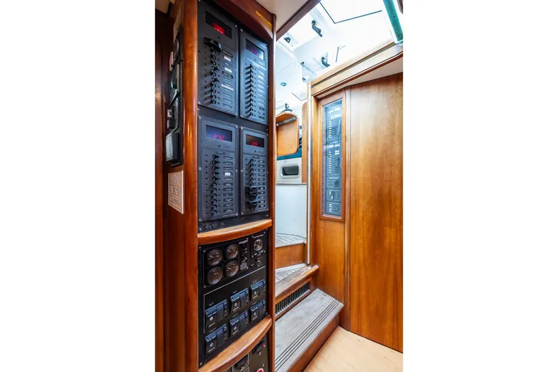 Slide: The Image of Electrical panel inside 2001 Kanter Bougainvillea 62 yacht with wooden interior. - 12