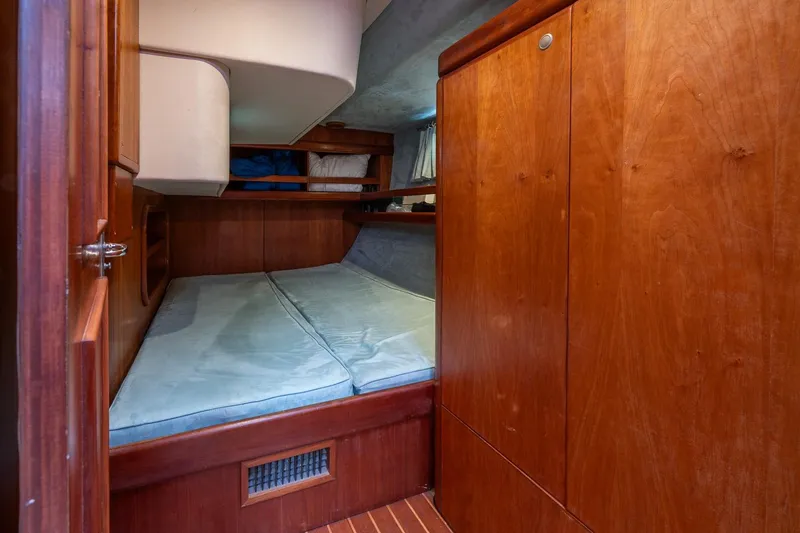 Slide: The Image of Cozy cabin interior of 2001 Kanter Bougainvillea 62 yacht with wooden furnishings. - 14