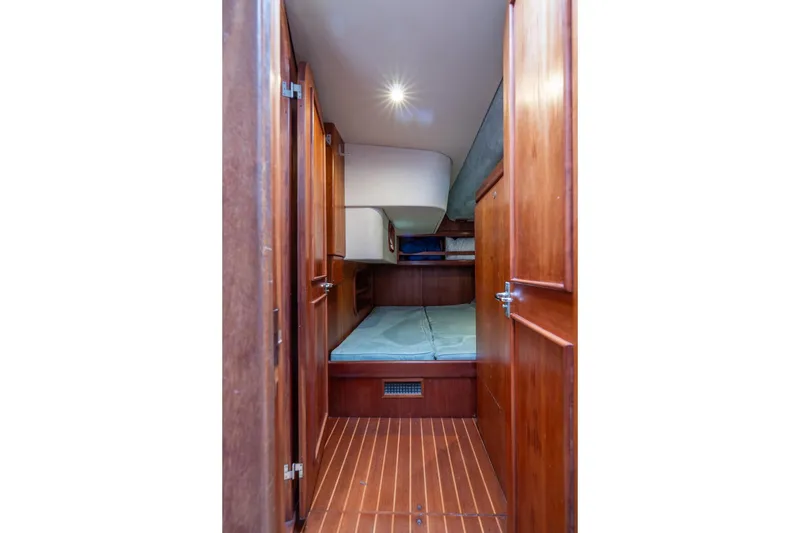 Slide: The Image of Cozy cabin interior of 2001 Kanter Bougainvillea 62 yacht with wooden finish. - 16