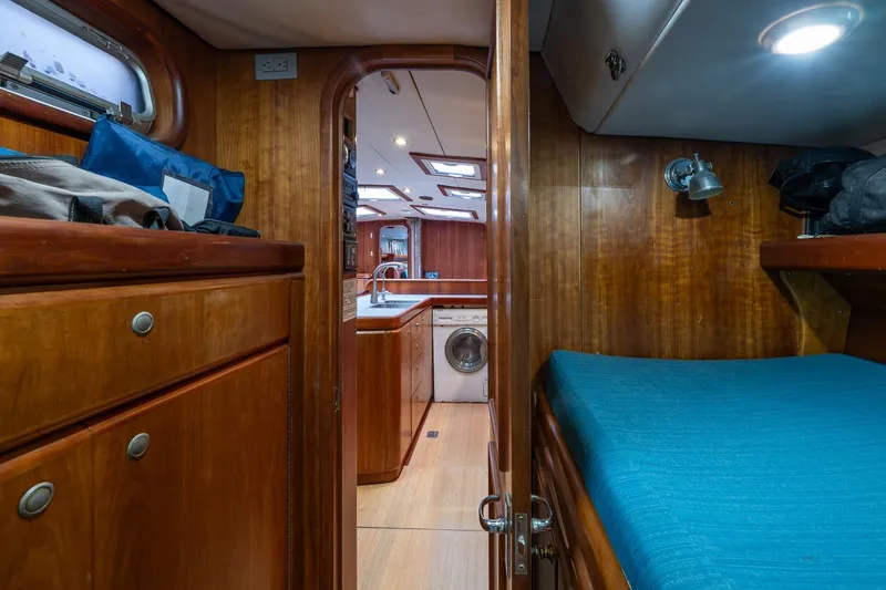 Slide: The Image of Interior of 2001 Kanter Bougainvillea 62 yacht with wood finish and compact kitchen. - 22