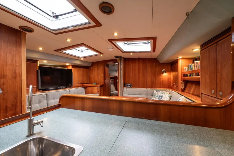 Slide: The Image of Luxurious 2001 Kanter Bougainvillea 62 yacht interior with wood paneling and skylights. - 25