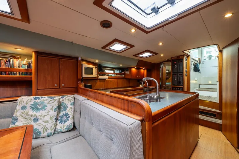 Slide: The Image of Luxurious interior of 2001 Kanter Bougainvillea 62 yacht with wood finishes and modern amenities. - 26