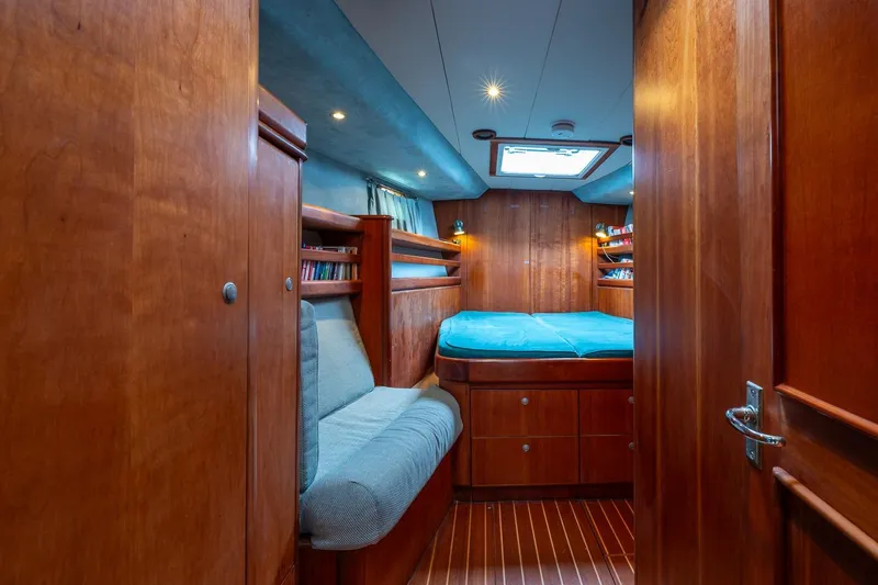 Slide: The Image of Luxurious 2001 Kanter Bougainvillea 62 yacht cabin with wood interior and cozy bed. - 30