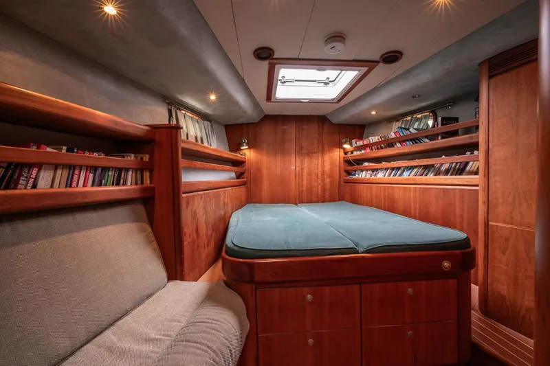 Slide: The Image of Luxurious 2001 Kanter Bougainvillea 62 yacht cabin with wooden interior and cozy bed. - 31