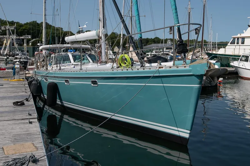 Slide: The Image of Sailboat Kanter Bougainvillea 62, 2001 model, docked at a marina. - 38