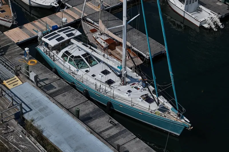 Slide: The Image of Sailboat Kanter Bougainvillea 62, 2001 model, docked at marina. - 40