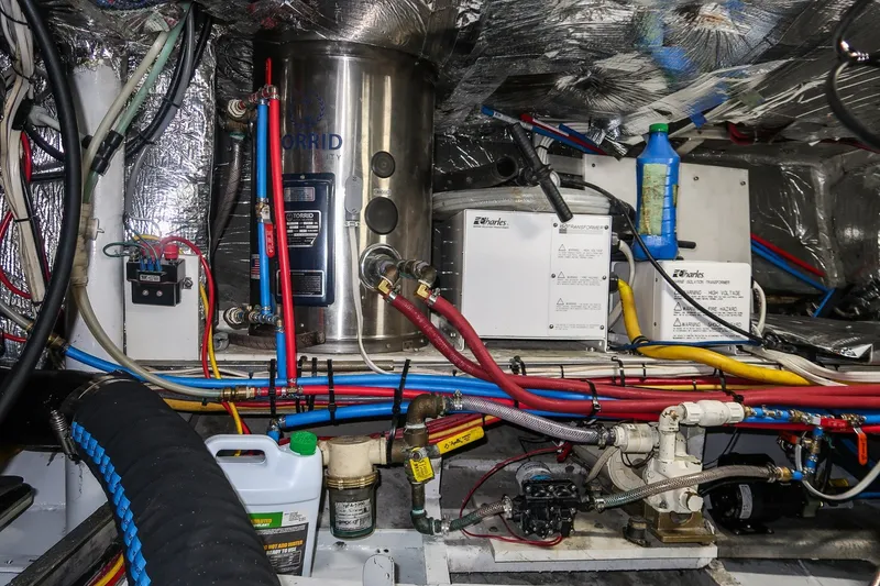 Slide: The Image of Engine room of 2001 Kanter Bougainvillea 62 with wiring and equipment. - 39