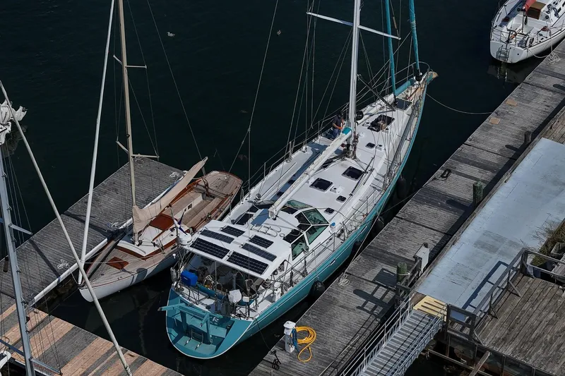 Slide: The Image of Sailboat Kanter Bougainvillea 62, 2001 model, docked at a marina. - 7