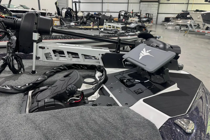 Slide: The Image of 2026 Skeeter ZXE21 boat interior with advanced navigation system and trolling motor. - 3