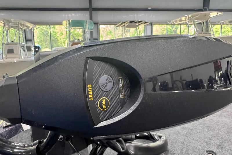 Slide: The Image of Close-up of 2026 Skeeter ZXE21 boat control panel with Quest and Pair buttons. - 5