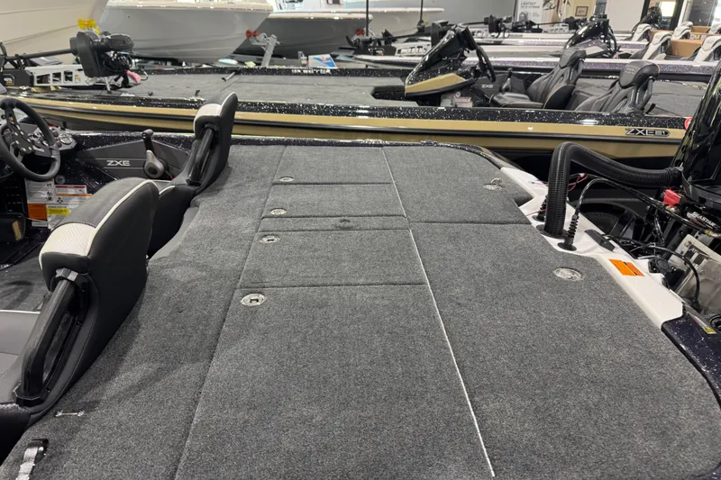 Slide: The Image of 2026 Skeeter ZXE21 boat interior with spacious deck and seating. - 8