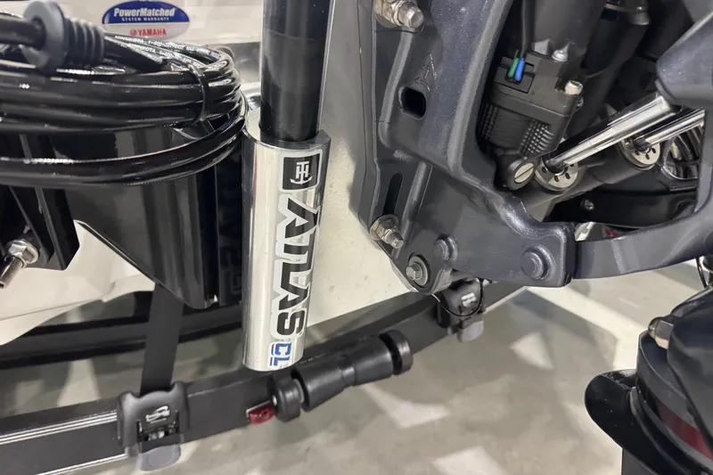 Slide: The Image of Close-up of a 2026 Skeeter ZXE21 boat motor with Atlas hydraulic jack plate. - 9