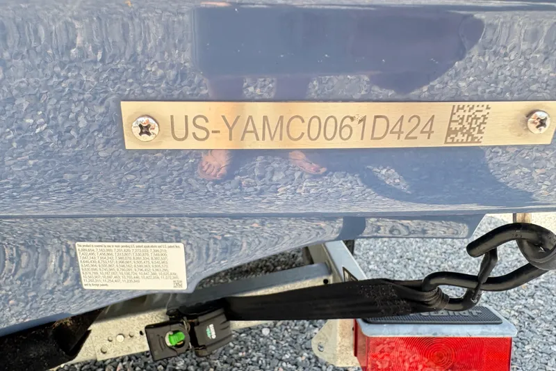 Slide: The Image of 2024 Yamaha Boats 195S hull identification number plate with QR code and trailer hitch. - 15
