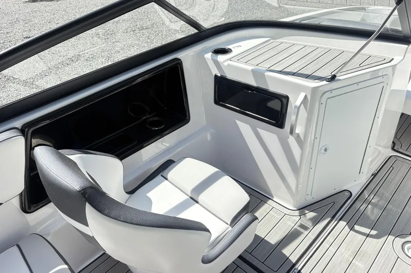 Slide: The Image of 2024 Yamaha Boats 195S interior with sleek seating and modern dashboard design. - 6